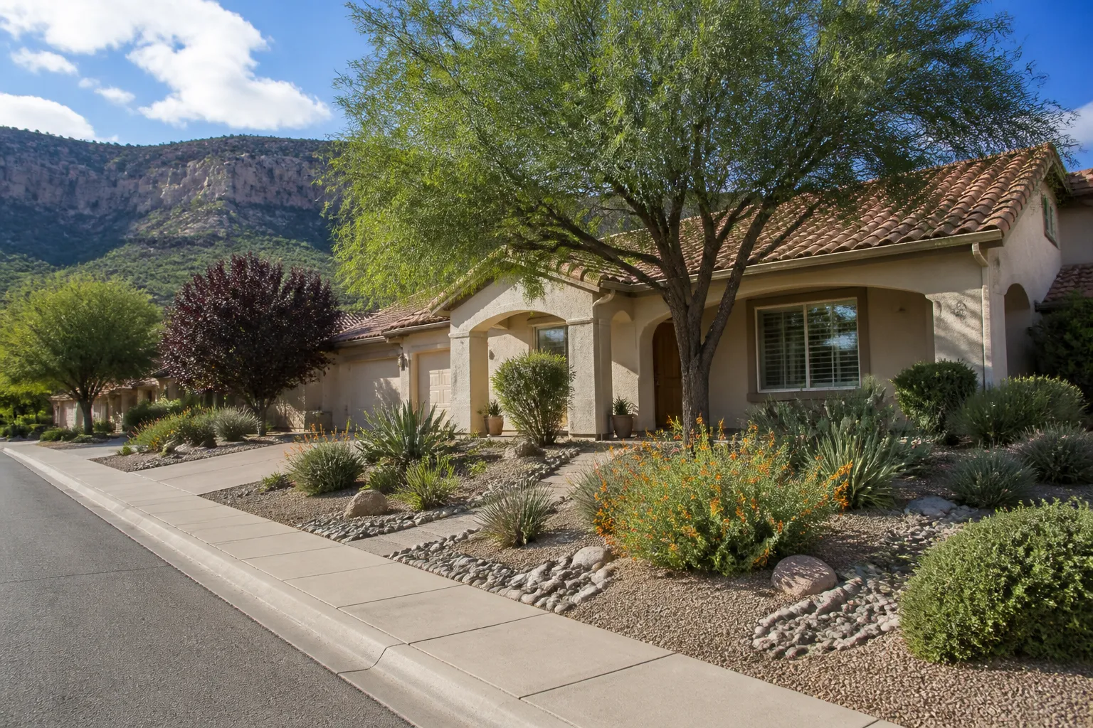 Welcoming Cottonwood neighborhood with desert landscaping.